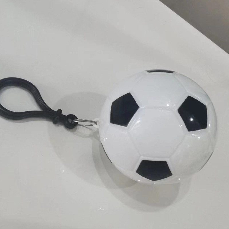 Wholesales portable football disposable raincoat ball key-chain disposable compression raincoat outdoor backpack pendant poncho