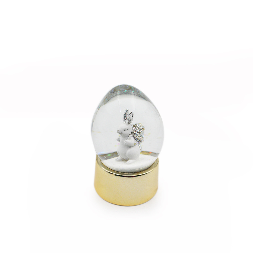 Home decoration egg shape silver golden rabbit resin easter snow globe