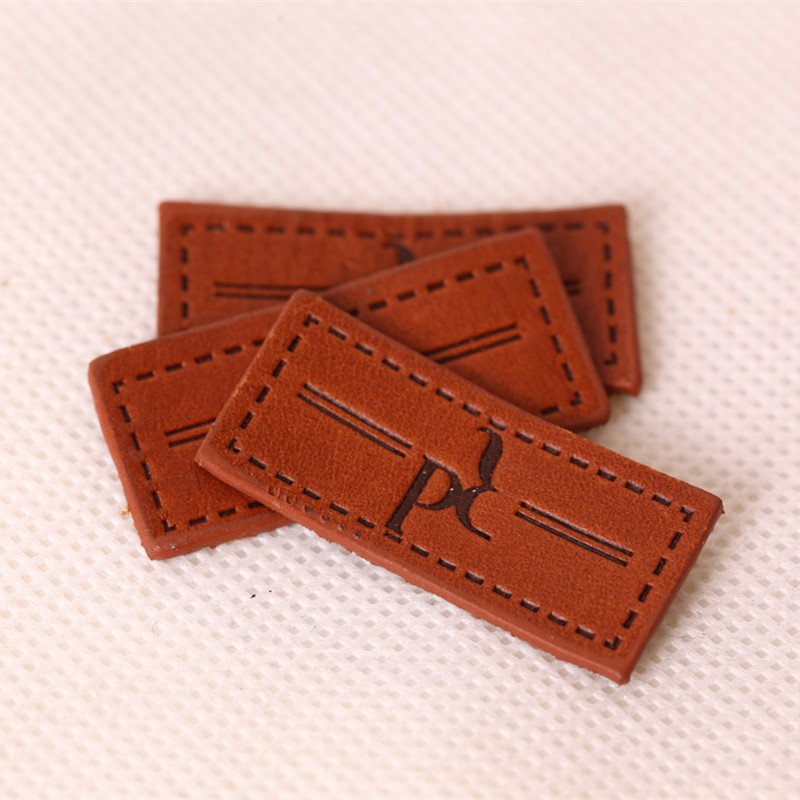 Washable fashion embossing denim faux leather patch,genuine leather label for apparel