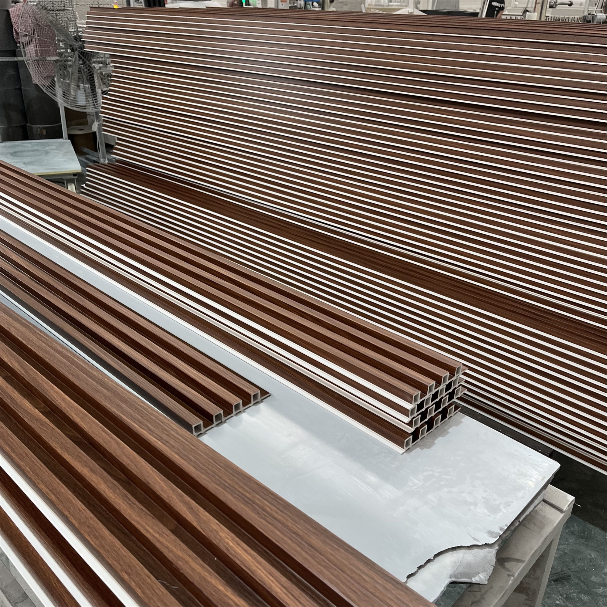 Capped interior wall panel hollow sheet house siding wpc decorative timber slats co-extrusion walnut fluted plank cladding