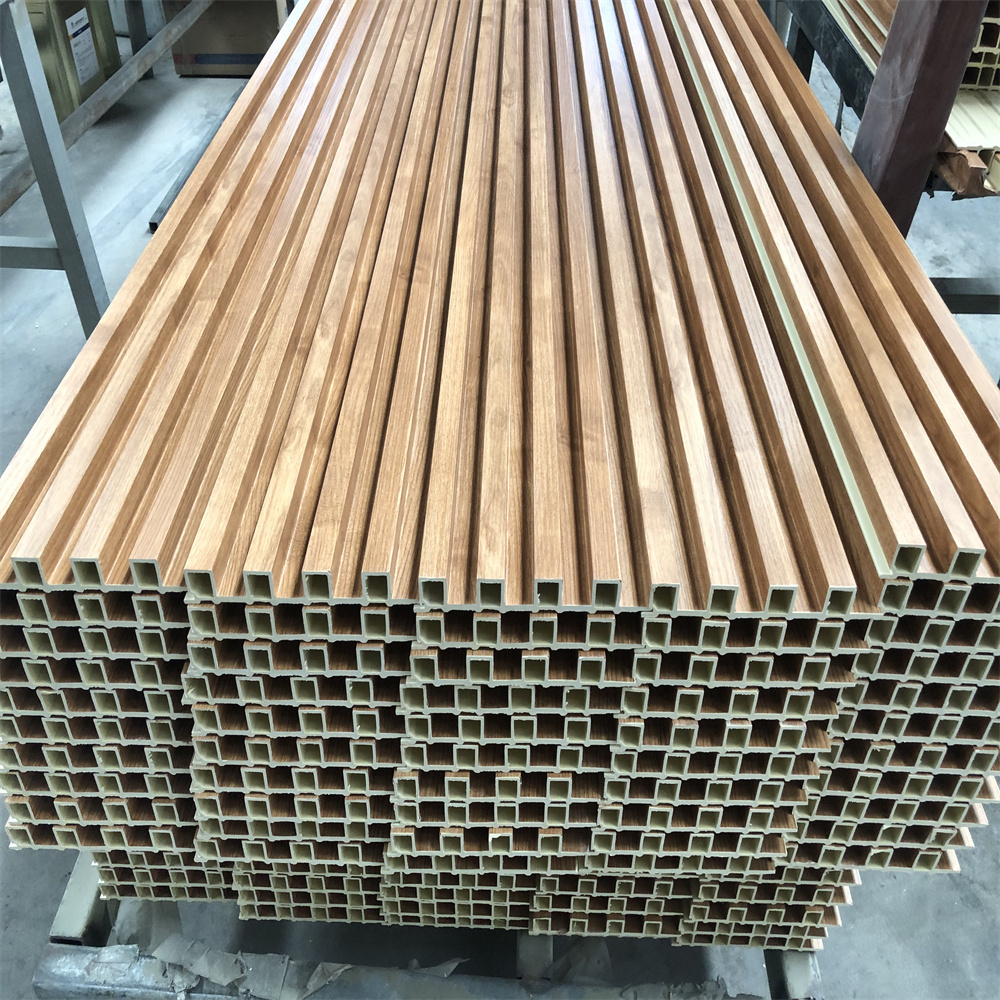 3d grain surface fireproof lambrin wood veneer fluted wpc wall panel  pvc cladding coating board interior decoration