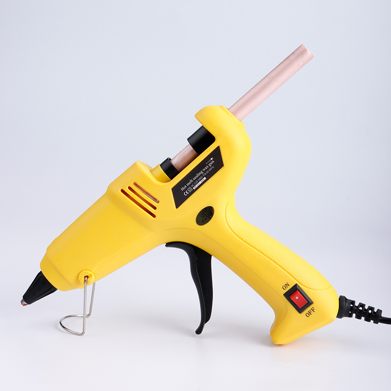 Hot melt wax gun