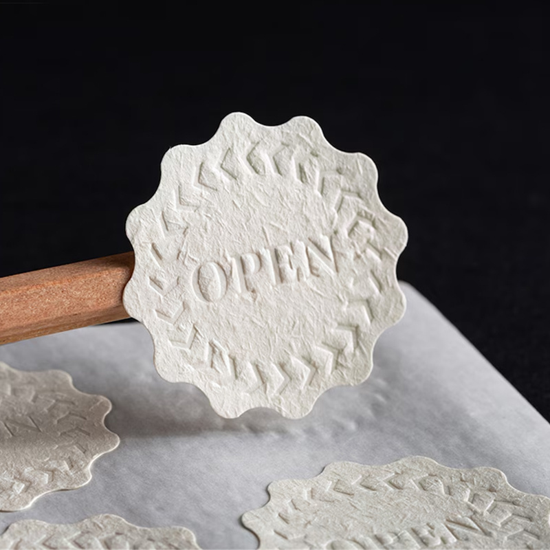 Custom the special texture paper embossed stickers with varied shape logo stickers for packaging and decorating