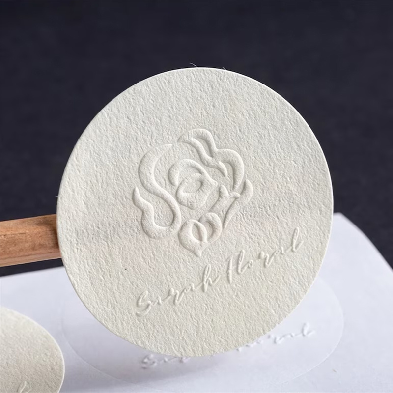 Custom the special texture paper embossed stickers with varied shape logo stickers for packaging and decorating