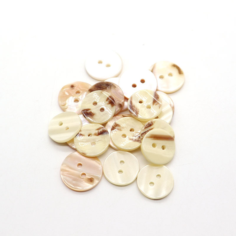 Wholesale custom decorative luxury buttons two hole round natural shell button for shirt clothing and headbands