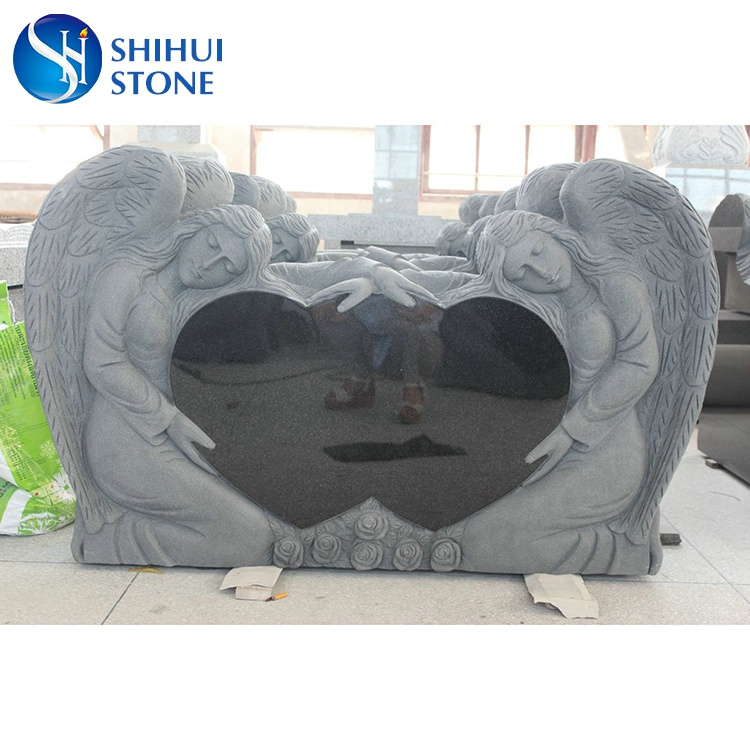 Granite monument heart shaped double angel headstone