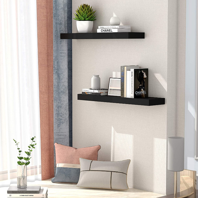 Black decorative wooden wall shelf suitable for storage in kitchen and bedroom