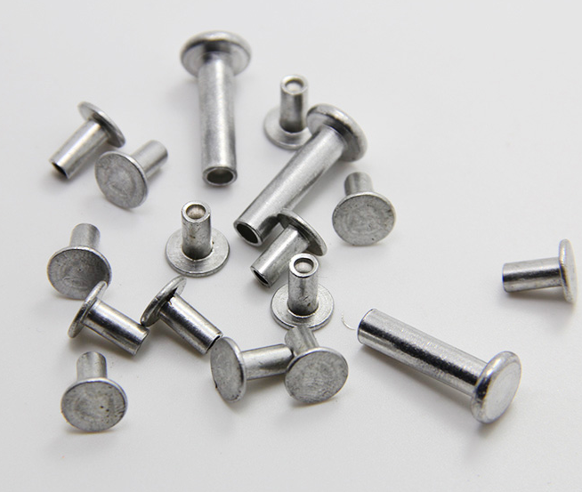 DIN 7338 flat head semi tubular steel rivet