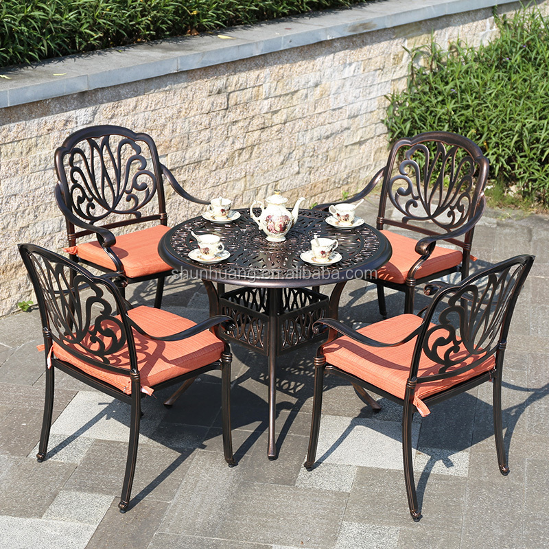 Factory price outdoor garden furniture set cast aluminium dining set ceramic table top