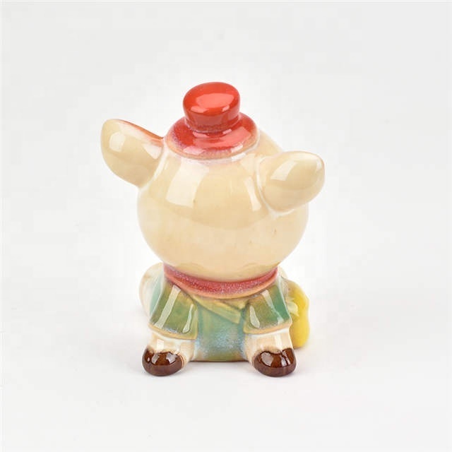 Mini cheap home desktop decoration new product Sitting style Cartoon Animal Statue Ornament sculpture Blue and red ceramic pig