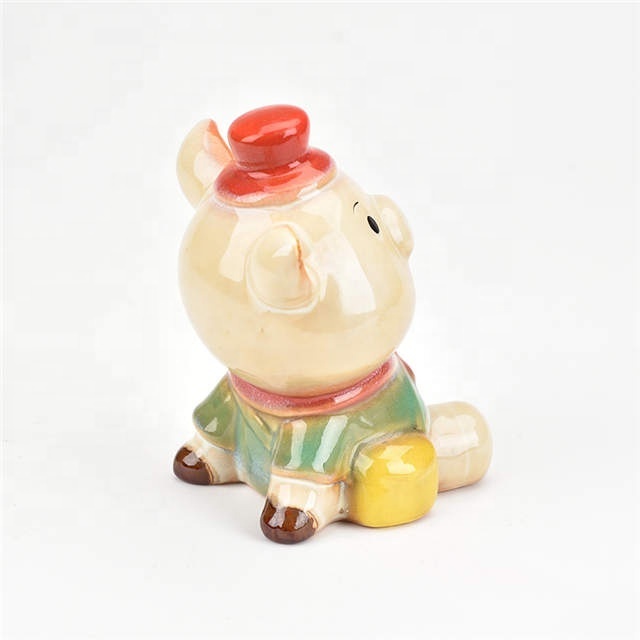 Mini cheap home desktop decoration new product Sitting style Cartoon Animal Statue Ornament sculpture Blue and red ceramic pig