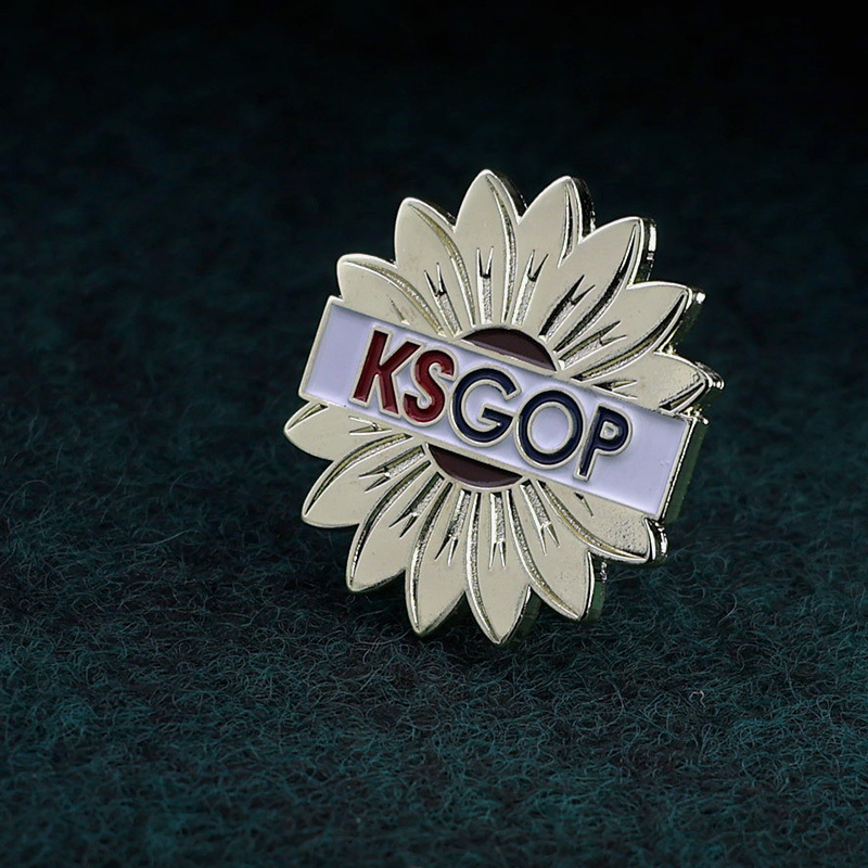 Metal flower with KSGOP letters lapel pin