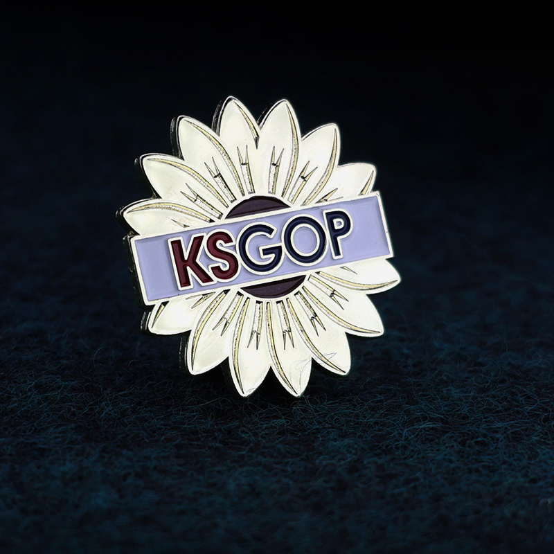 Metal flower with KSGOP letters lapel pin