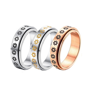 New ring black rose gold drip oil spinner stainless steel pressure reducing sun flower couple ring Finger Rings