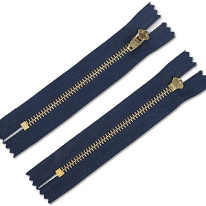 Wholesale clothes accessories 5# double polished gold close-end metal zipper bangladesh metal zipper