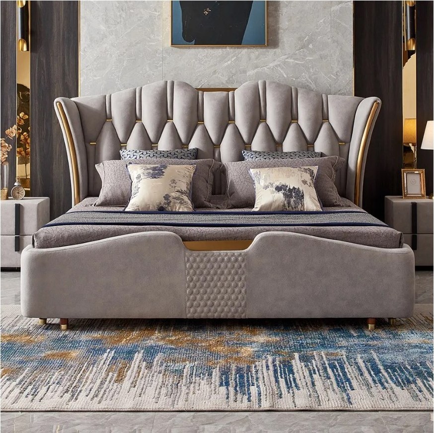 Light gray wingback headboard upholstered tuffted king bed