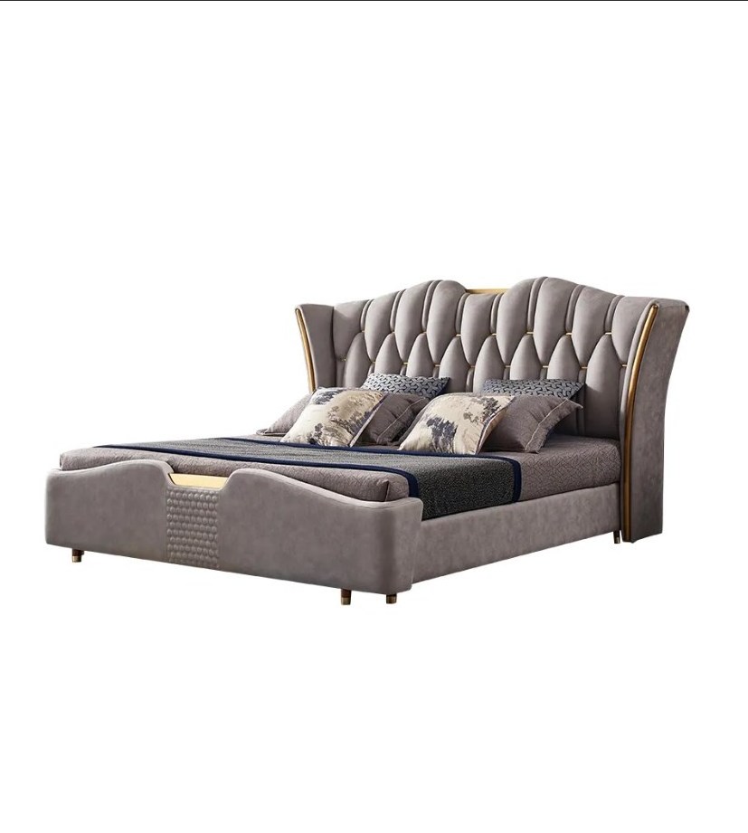 Light gray wingback headboard upholstered tuffted king bed