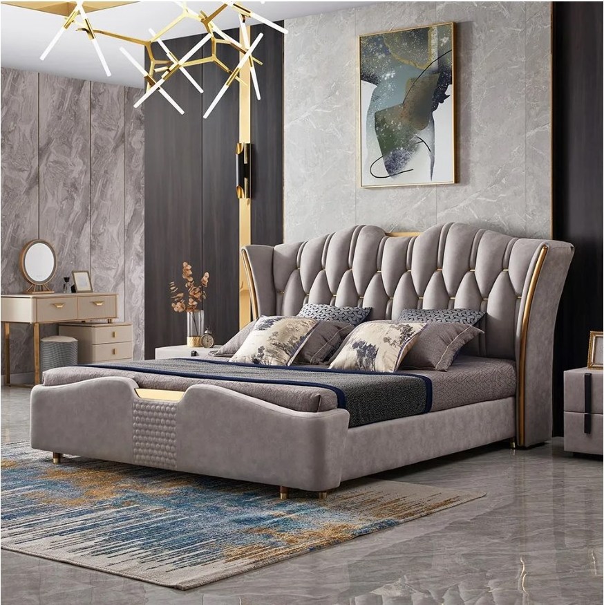 Light gray wingback headboard upholstered tuffted king bed