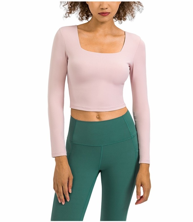 New Arrival Nude Feel Yoga Clothes Solid Color High Elastic Belt Chest Pad Yoga Long Sleeve Sexy Navel Workout Top Women