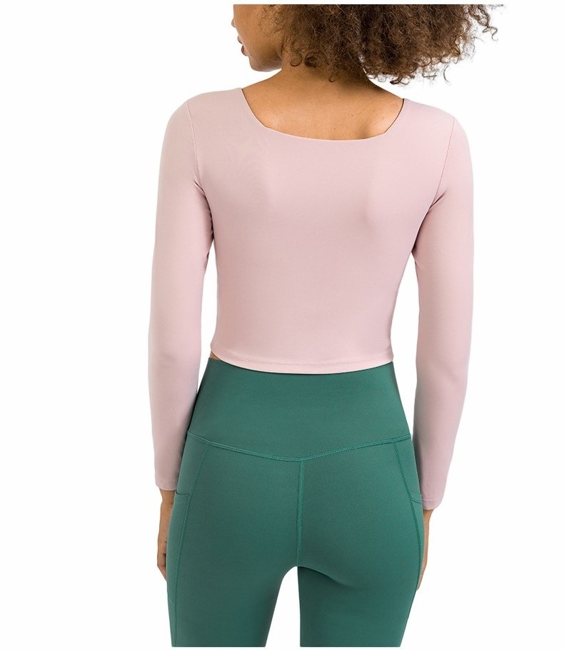 New Arrival Nude Feel Yoga Clothes Solid Color High Elastic Belt Chest Pad Yoga Long Sleeve Sexy Navel Workout Top Women