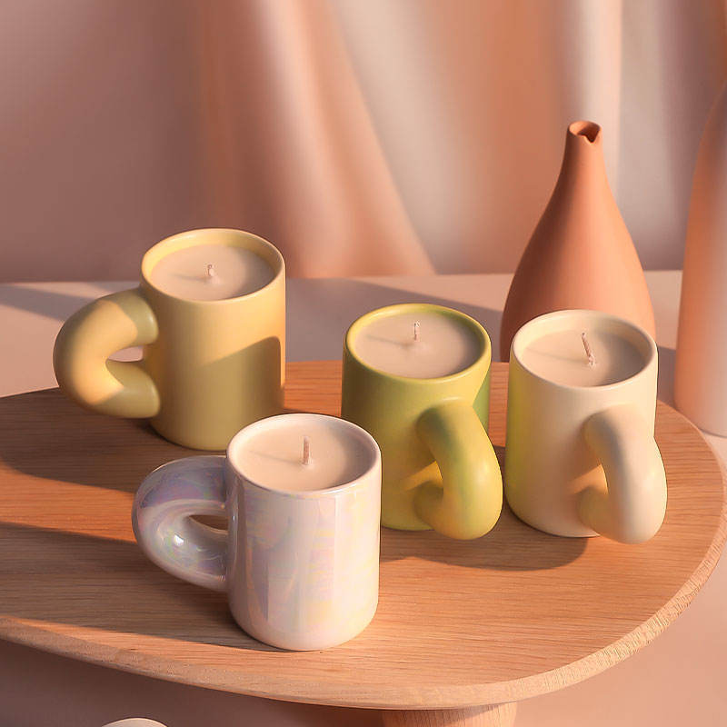 Best selling unique design tealight candle holder cup cheap ceramic candle ceramic tea light holder with handle