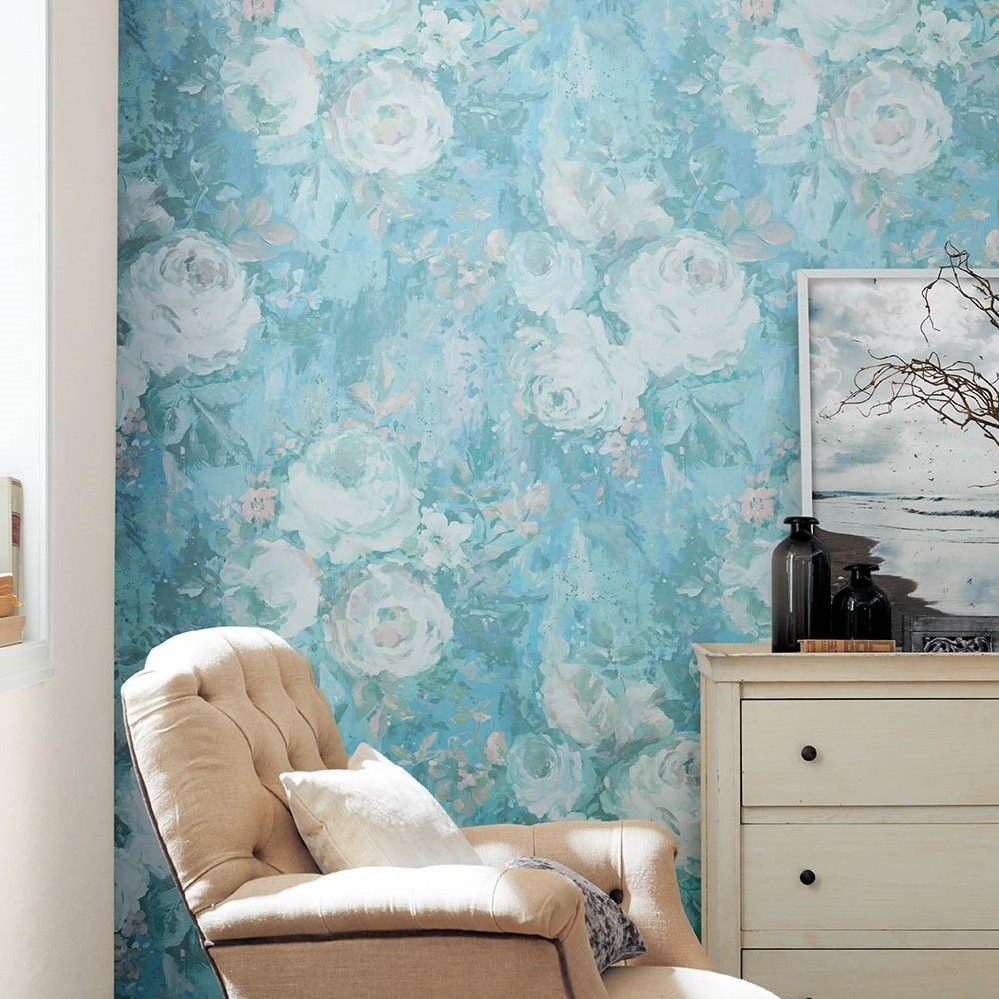 The bedroom is wrapped in rose flower design wallpaper and let's sleep soothingly.