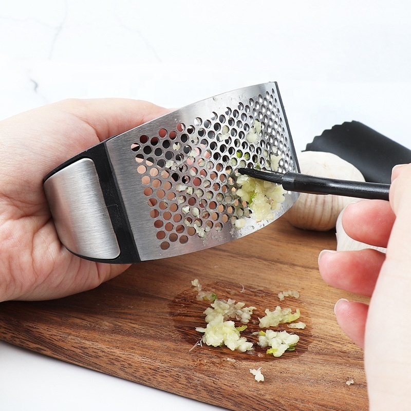 Kitchen gadgets Stainless Steel 2 in 1 Handled Garlic Press Rocker And Peeler Set