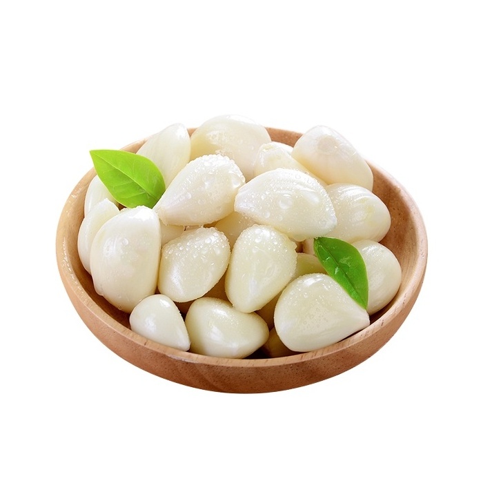 Sinofarm brand new crop fresh Chinese peeled garlic cloves packed by vacuum for wholesale with GAP low price for sale in China