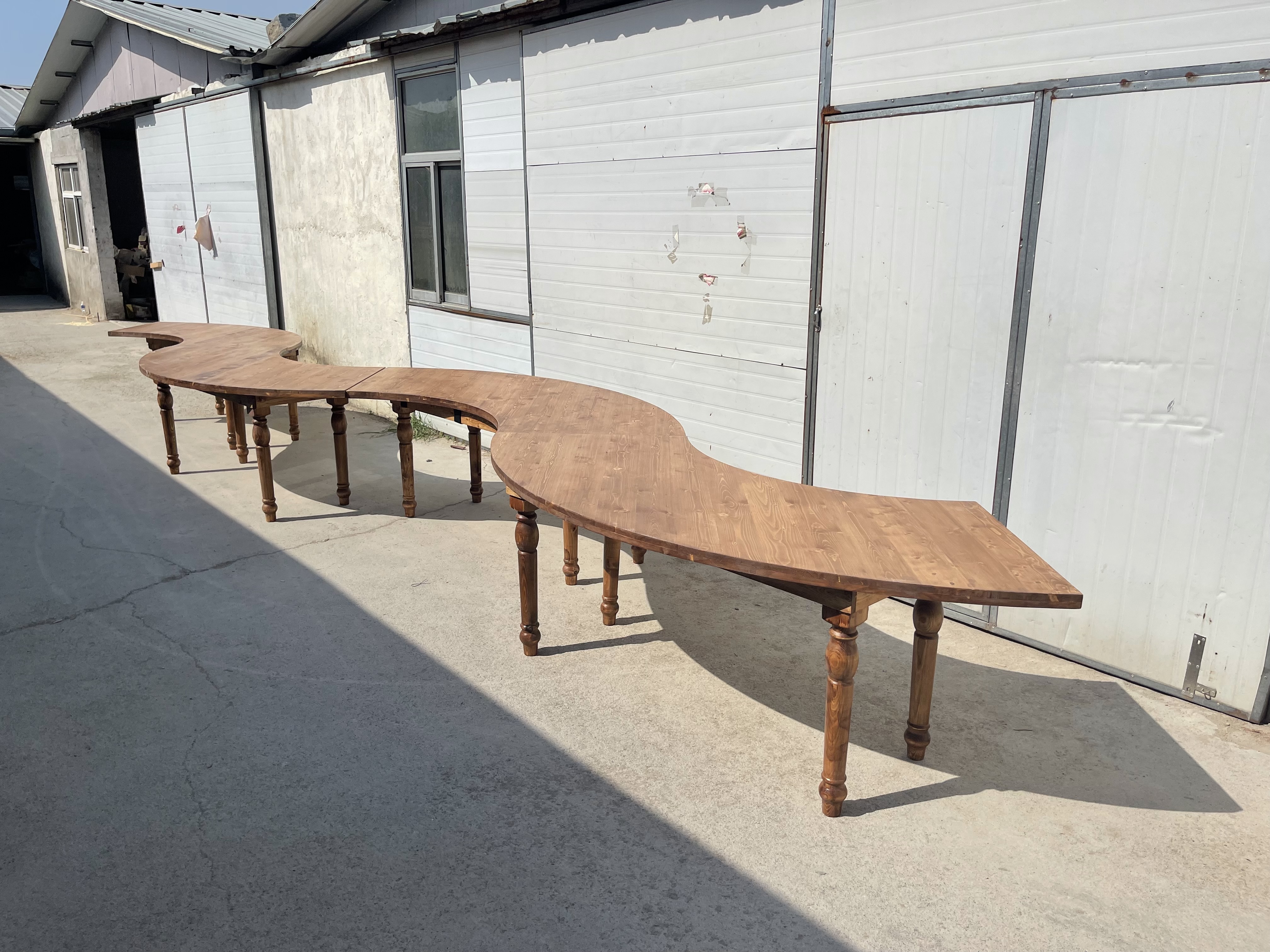 Sinofur rustic curved serpentine farm harvest  table