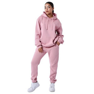 Custom Oversized hoodie jogger set for women with handwritten embroidery logo on the chest and kangaroo pocket and drawstring