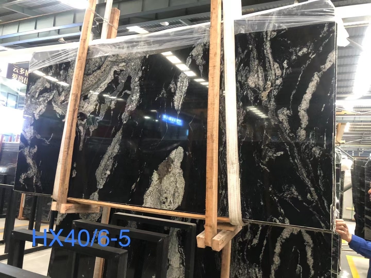 Titanium black volcano granite price for slabs and tiles