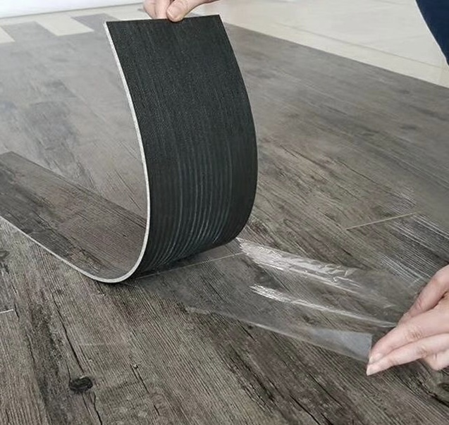 Low Price Waterproof peel and stick tiles floor vinyl lvt self adhesive pvc plastic floor