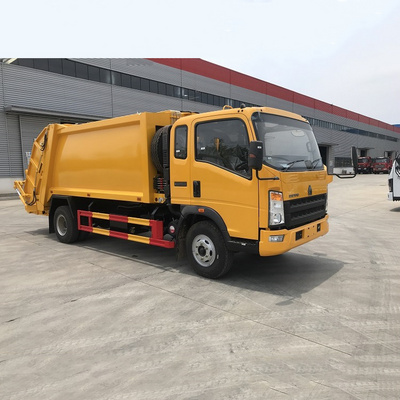 SINOTRUK HOWO 5-10 Ton 4x2 Left Hand Driving garbage compactor truck with hook arm