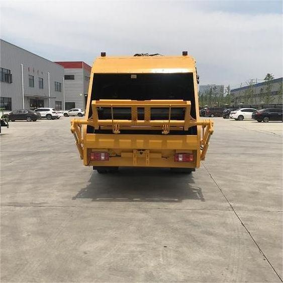 SINOTRUK HOWO 5-10 Ton 4x2 Left Hand Driving garbage compactor truck with hook arm