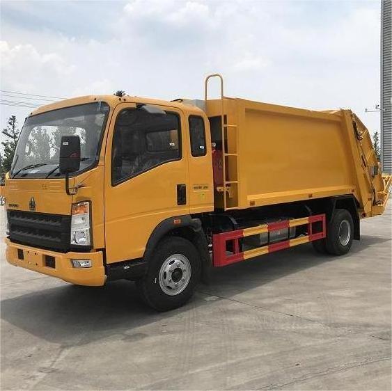 SINOTRUK HOWO 5-10 Ton 4x2 Left Hand Driving garbage compactor truck with hook arm