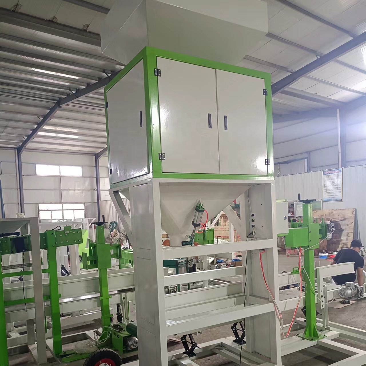 Parboiled rice packing machine with filling and bag sewing machine