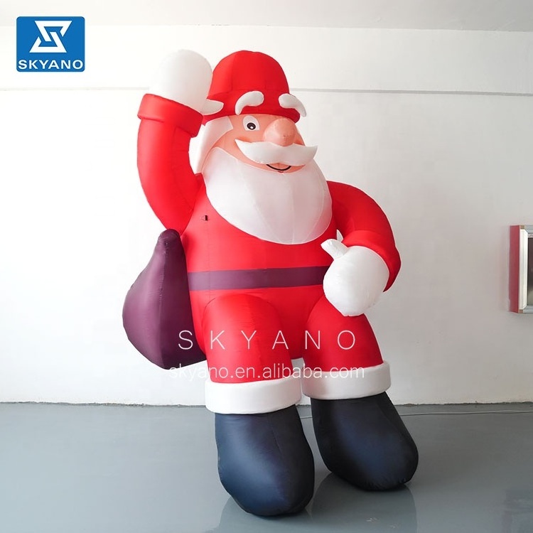 Inflatable giant Santa Claus Christmas Advertising Giant Inflatable Christmas  Santa Claus sitting on the roof for sale