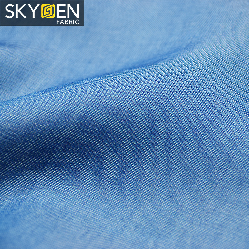 Skygen OEM jeans shirt dress wholesale solid soft woven 100% twill lyocell denim fabric for garments