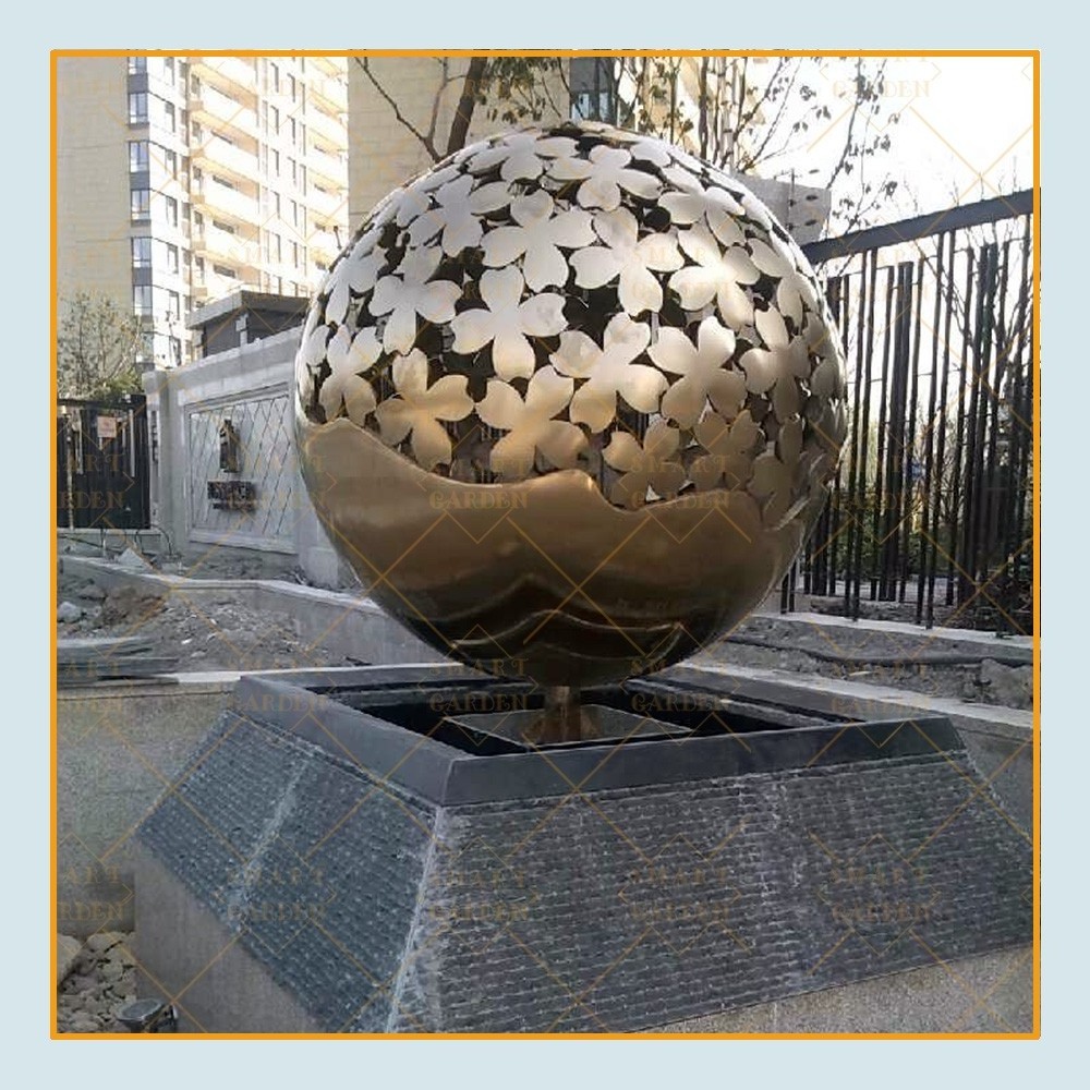 Metal water fountain globe stainless steel golden hollow ball sculpture for sale