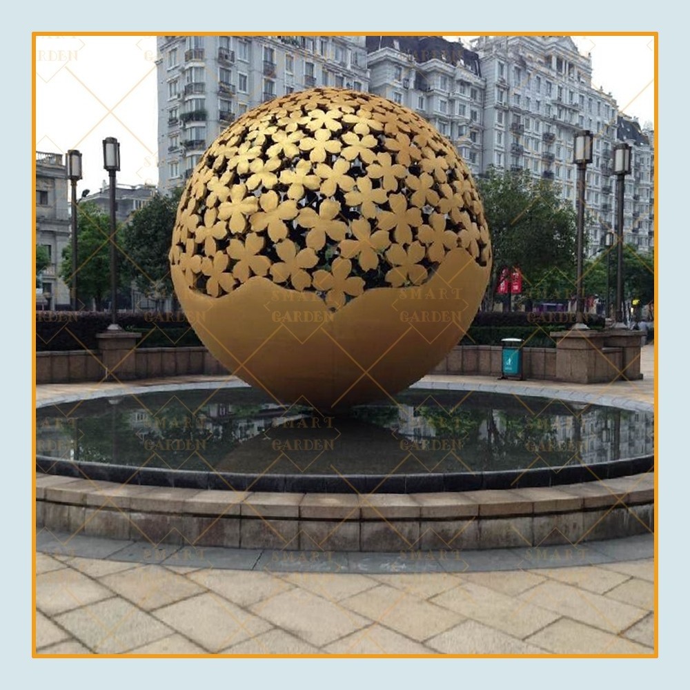 Metal water fountain globe stainless steel golden hollow ball sculpture for sale