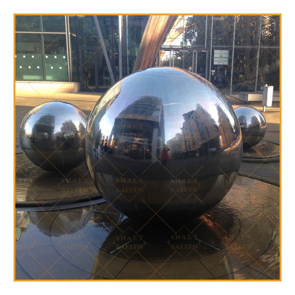 Metal water fountain globe stainless steel golden hollow ball sculpture for sale