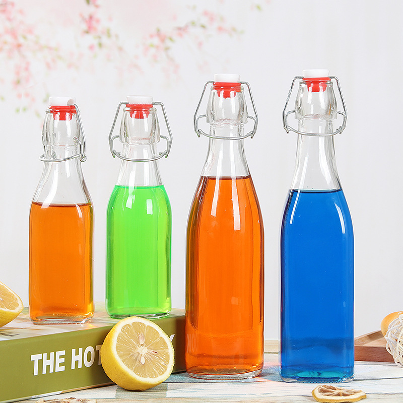 Factory Product 500ml Clear Flat Bottom Empty Glass Bottle Juice Soda Wine 16oz Kombucha Swing Top Beer Bottle with Swig Top Cap