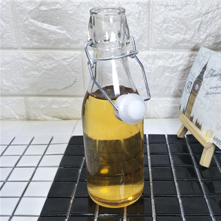 Wholesale 330ml 500ml 1000ml Amber Grolsch empty custom swing top clear glass beer bottle