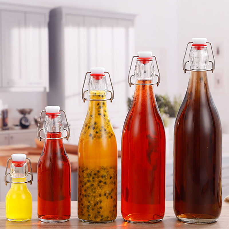 products supply  cheap stocked flip top cooking oil round glass bottle swing top 100ml 250ml 500ml 750ml 1000ml