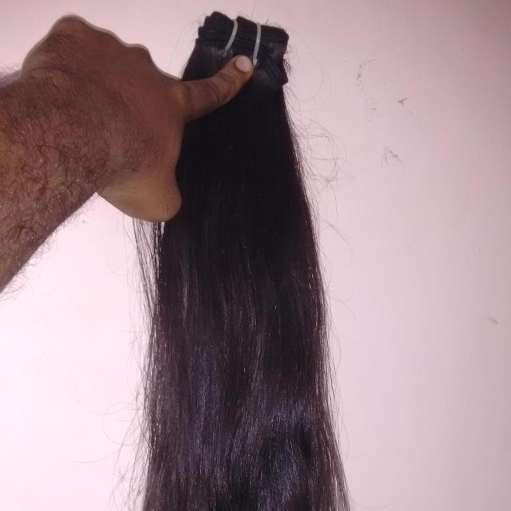 Raw human hair weaving.Best temple human hair wafting from india