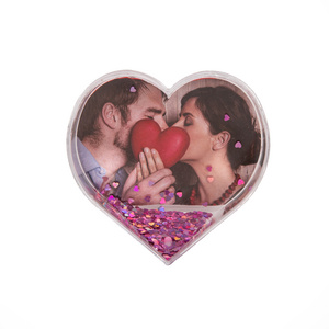 Hot sales wedding decor heart shape liquid floating glitter plastic insert picture photo frame snow water globes