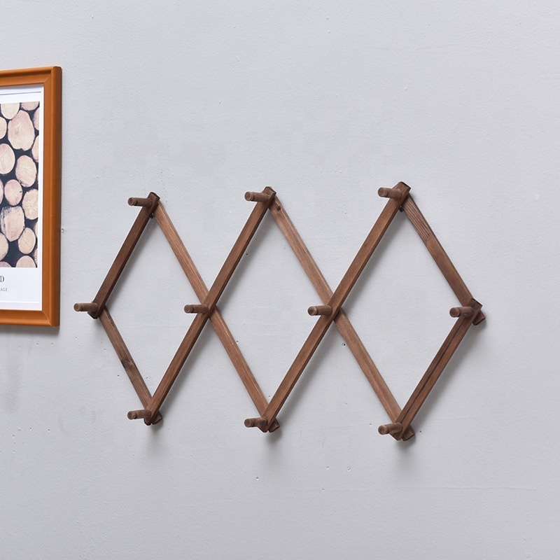 Accordion Style Wood Expandable wall hook shelf folding diamond hanger in livingroom