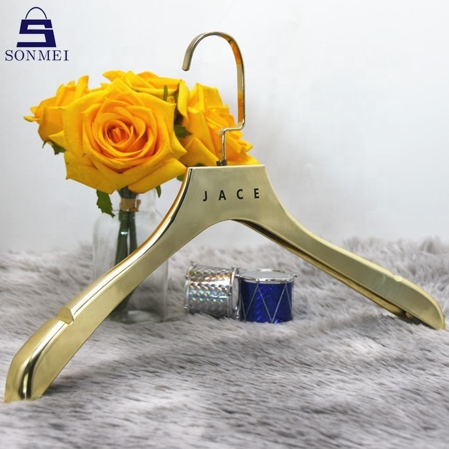 Garment shiny plastic display custom gold hangers for clothes