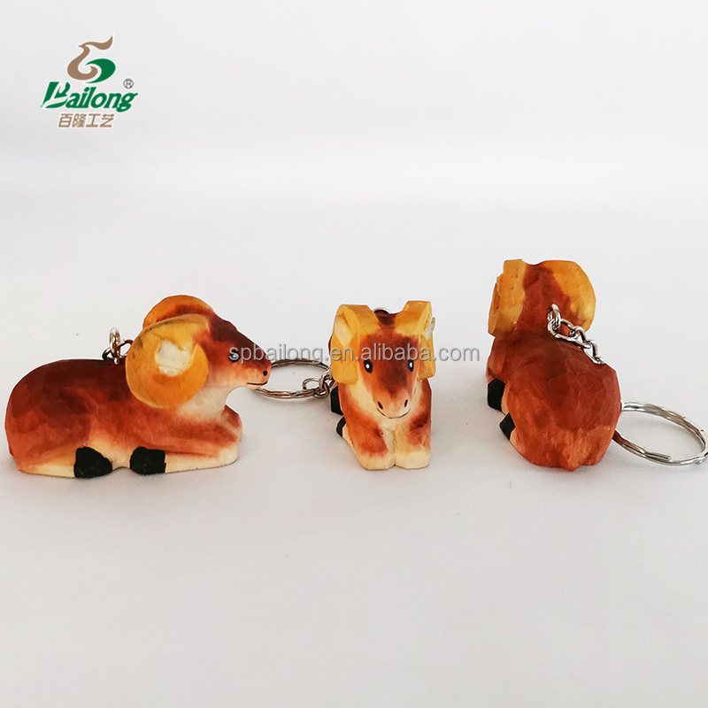 Handmade custom gift and souvenir handmade carving wood animal keychain