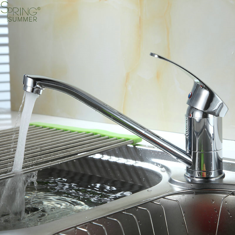 Processing and production of 360-degree rotating hot and cold water brass kitchen faucet